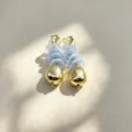 Detailed shot of trendy geometric flower earrings featuring light blue layered beads and gold drops. - 4#