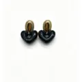 Close-up of elegant black resin heart earrings featuring gold-tone textured oval top studs. - Black