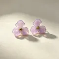 Close-up of sweet purple resin flower stud earrings with gold bead center for daily wear. - Colorful