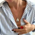 Elegant smooth teardrop pendant necklace and square ring detail view fashion jewelry. - Silver