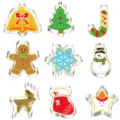 Detailed view of stainless steel Christmas cookie cutters set including tree, bell, and deer shapes. - 9-Piece Set / Silver