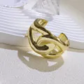 Wide gold-plated open cuff bracelet, minimalist chunky statement bangle for women. - Gold Cross