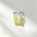 Close-up detail of light green natural stone bead dangle hoop earrings with metallic accents. - 7# Silver
