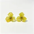Yellow resin flower stud earrings with metal ball center, sweet floral jewelry variant. - Yellow