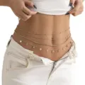 Detail shot of multi-layer gold waist chain and body chain, elegant beach bikini accessory for women. - 4-Piece Gold Waist Chain Sets