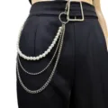 Detail shot of multi-layer waist chain featuring pearls and metal links for women fashion. - Artificial Pearl Waist Chain