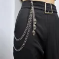 Punk gothic multi-layer metal pants chain with skull pendants, retro hip-hop waist chain for daily wear. - Double-Layer Skull Pendant Trousers Chain in Silver-Tone