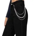 Detail view of the multi-layered pearl and metal waist chain, showcasing the hip-hop style. - White Gold Artificial Pearl Pants Chains Style 2