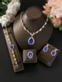 Primo piano dettagliato del lussuoso set di gioielli in cristallo blu a goccia. - Stile Cofanetto da 4 Pezzi (80848708)