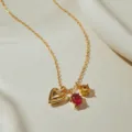 Goldfarbene Kette mit gepolstertem Herzanhänger sowie roten und gelben Zirkonsteinen. - Herz Rot Gelb Edelstein Anhänger Stil (KN0686) / 1 Stück