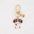 Cute cartoon brown and white dog metal keychain pendant with bell for bag charms. - Brown Bell Puppy
