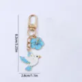 Cute blue flower and white dove bird metal keychain bag charm for women and girls daily use. - Peace Dove Shape / 8.2x2.8cm / White