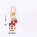 Porte-clés teckel de dessin animé mignon avec pendentif fraise émaillé, accessoire de sac. - Teckel Fraise