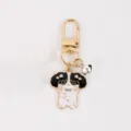 Cute cartoon dog metal keychain, stylish bag pendant and lovely accessory for kids and friends. - Black Bell Puppy