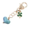Porte-clés élégant en alliage doré avec cœurs ajourés, trèfle et pendentif cœur bleu charm. - Cœur Bleu