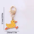 Cute yellow duck metal keychain bag charm, fashion enamel duck pendant with heart clasp. - Running Duck