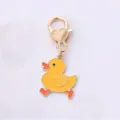 Adorable cartoon yellow duck metal keychain and cute bag charm, perfect gift accessory. - Running-away Duck