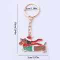 Portachiavi bassotto di Natale in metallo smaltato simpatico cucciolo borsa ciondolo - Cane Bassotto di Natale Oro / Oro
