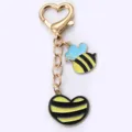 Süßer Bienen Schlüsselanhänger Metall Taschenanhänger Insekt Charm Geschenk für Damen - Biene Gestreiftes Herz