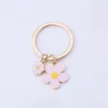 Cute enamel flower keychain, double sided pink floral pendant, stylish bag charm accessory. - Pink Double-sided Flower