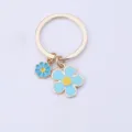 Cute blue enamel flower keychain with gold metal ring, fresh double-sided floral pendant. - Blue Flower