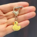 Cute little yellow duck metal keychain pendant with heart clasp, fashion handbag charm. - Duck