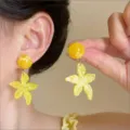 Gelbe Harz Seestern Quaste Ohrringe Detailansicht, perfekte Sommer Strand Urlaubs Ohrringe Stil. - Gelbe Seestern Ohrringe