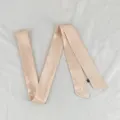 Detailed view of pink satin wave ribbon, ideal as a chic hair scarf or stylish bag accessory. - PDXJ-Solid Color Vertical Waves, Nude Apricot