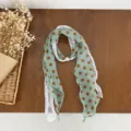 Green polka dot chiffon scarf with white lace trim and pearl ring accessory for women. - Bean Green