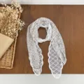 Detail view of the floral lace spliced pearl ribbon scarf, highlighting delicate textures. - HMS Forest Gauze - Apricot