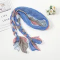 Detailed view of the colorful braided crinkle scarf, soft textured fabric for women styling. - Sky Blue Gray Pink