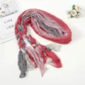 Detailed view of the colorful crinkled braided scarf, showcasing texture and fabric. - Pink Light Gray