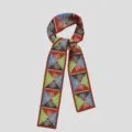 Detailed view of a slim multicolored geometric twilly scarf with floral print for stylish wear. - PDPJ-Blue Green Squares