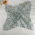 Close-up of vintage floral silk square scarf, ideal for chic daily neckwear and hair styling. - LM58 - Orchid Field
