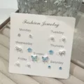 Set de 7 días pendientes de botón mariposa lazo estrás perla joyería elegante - Conjuntos de pendientes de mariposa azul / Azul