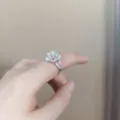 Elegante anillo de flor de camelia plateada vintage abierto y ajustable para mujer - Anillo de Flor Plateado