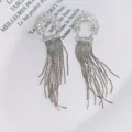 Elegantes pendientes largos de borla y diamantes de imitación para mujer, joyería brillante. - Pendientes de botón de semicírculo con circonita y borla - plateado