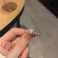 Silver rectangular zircon ring variant showing detailed square stone halo setting. - Silver Square Zirconia Ring