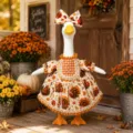 Detailed view of autumn Thanksgiving goose outfit, turkey print dress and bow for yard decor. - Little Turkey Thanksgiving Collection