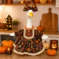 Detailed close-up of the Halloween goose outfit with pumpkin prints and matching bow hat setup. - Floral Pumpkin Halloween Collection