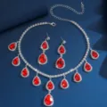 Splendido set di collana e orecchini in cristallo a goccia rossa, gioielli da sposa. - Rosso