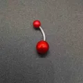 Stainless steel curved barbell belly button ring with glossy red acrylic balls for piercing. - Red (JE1651K)