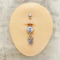 Piercing para ombligo de acero inoxidable con circonita transparente y búho colorido. - Estilo Búho Plateado (JE1569N)