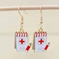 Cute nurse theme enamel notebook and pencil hook earrings, perfect for medical staff gifts. - Notebook and Pencil Style