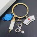 Nurse keychain metal medical keyring nurse hat stethoscope syringe keychain gift for doctors. - Blue Mask Syringe Style (JE1583E)