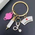 Nurse keychain medical enamel charm keyring stethoscope syringe pendant gift gold finish - Pink Mask Syringe Style (JE1583F)