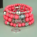 Set di bracciali con perline multistrato boho con perline opache rosa e ciondolo albero della vita donna. - Rosa