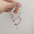 Pulsera de cuentas de cerámica de estilo étnico con colgante de hoja de metal y trébol mujer - Flor de Durazno