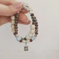 Ethnic style ceramic beaded double-layer bracelet with vintage silver charms and pendants. - Lion Head