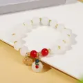 Bracciale di perle imitazione giada in stile cinese con perle rosse e ciondoli dorati retrò. - Stile 10 Ciondolo Zucca Verde Fortuna (5374646856719)